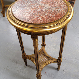 Late 19th Century French Louis XVI style round marble top side table/ lamp table. It is in good original detailed condition and has been sourced from France.