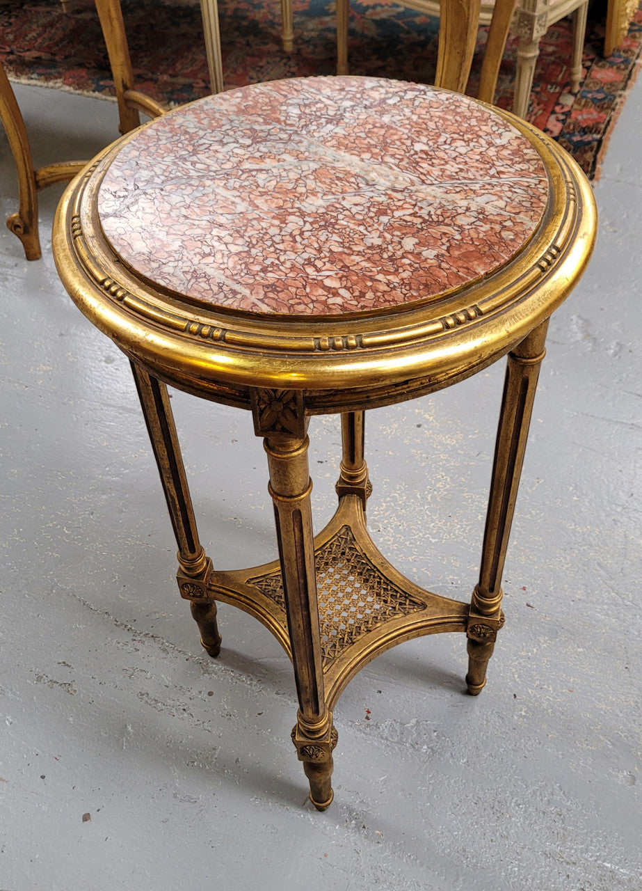 Late 19th Century French Louis XVI style round marble top side table/ lamp table. It is in good original detailed condition and has been sourced from France.