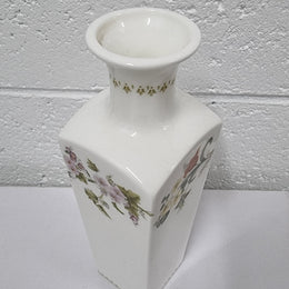 Lovely floral Wedgwood white vase with a pretty design in good condition, please view photos as they help form part of the description.