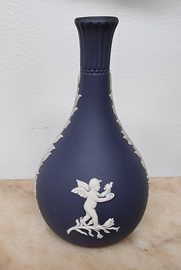 Wedgwood blue and white Jasper Ware bud vase. It is in good original condition with no chips or cracks, please view photos as they help form part of the description.