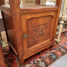 Charming pair of French Oak Arts and Crafts bedsides with shelf, cupboard with carving and marble top.  They have been sourced from France and are in good original detailed condition.