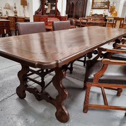 Amazing hard to find French Fruitwood Spanish style 3 meter dining table. Decorative iron work underneath and in good detailed original condition.
