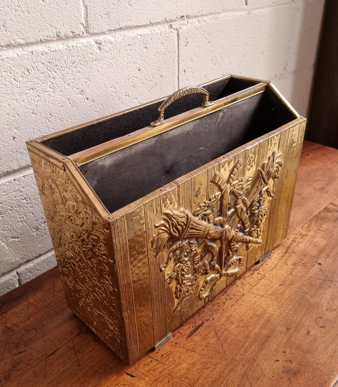 Vintage Brass repousse hammered magazine holder rack. Sourced locally and in good original condition, please view photos as they help form part of the description.