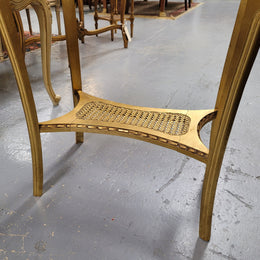 Impressive French oval Louis XVI style gilt and white marble topped two tier lamp/side table. It has been sourced from France and is in good original detailed condition.