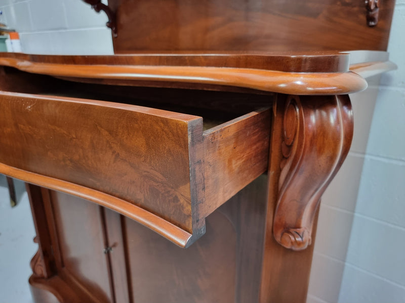 Beautiful Antique Victorian Mahogany two door Chiffonier. Plenty of storage space with one drawer and the two doors open up to a shelved area. It is in good restored condition.