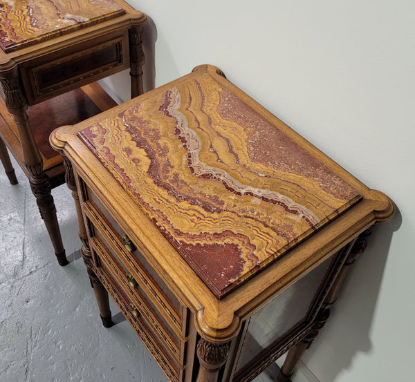 Impressive Pair Henry II Style Walnut bedsides. Beautiful red onyx marble tops and fine carving decoration. One is open style with one drawer and shelf whilst the other has three drawers. Fully restored condition.