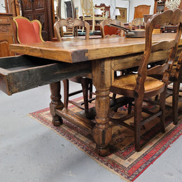 Large impressive 19th century 2.5 meter Antique French Oak farmhouse table. Loads of character with a stunning solid thick top and has a long drawer at one end. Sourced from France and in good original detailed condition.
