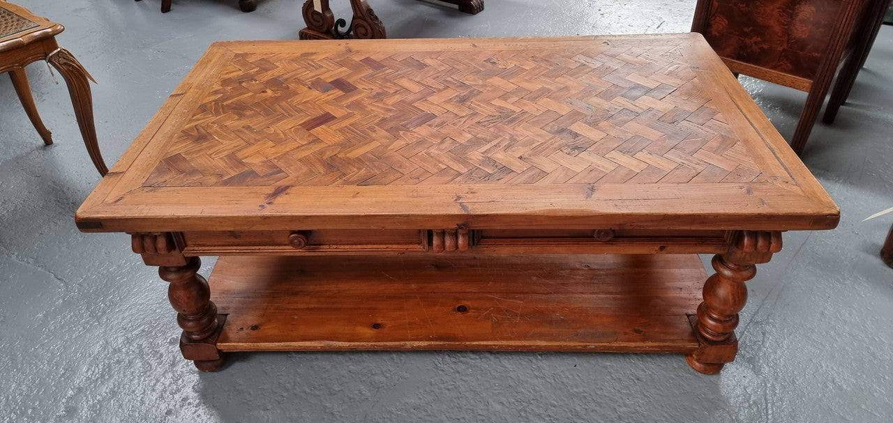 Beautiful Vintage Fruitwood, parquetry top coffee table with two drawers and storage underneath. It is in good original detailed condition.