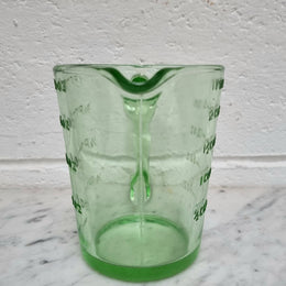 Vintage green depression glass jug. In good original condition.
