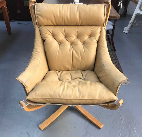 Fabulous Midcentury leather "Sigurd Ressell Falcon Chair" from Norway in good used condition with minor scratches to the leather consistent with age. Very sturdy and comfortable.