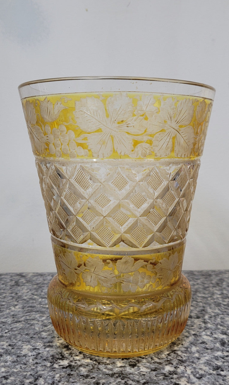 Antique Amber Bohemian acid etched and wheel engraved crystal vase. It has a stunning frieze of vine branches and a star cut base. It is in good original condition, please view photos as they help form part of the description.