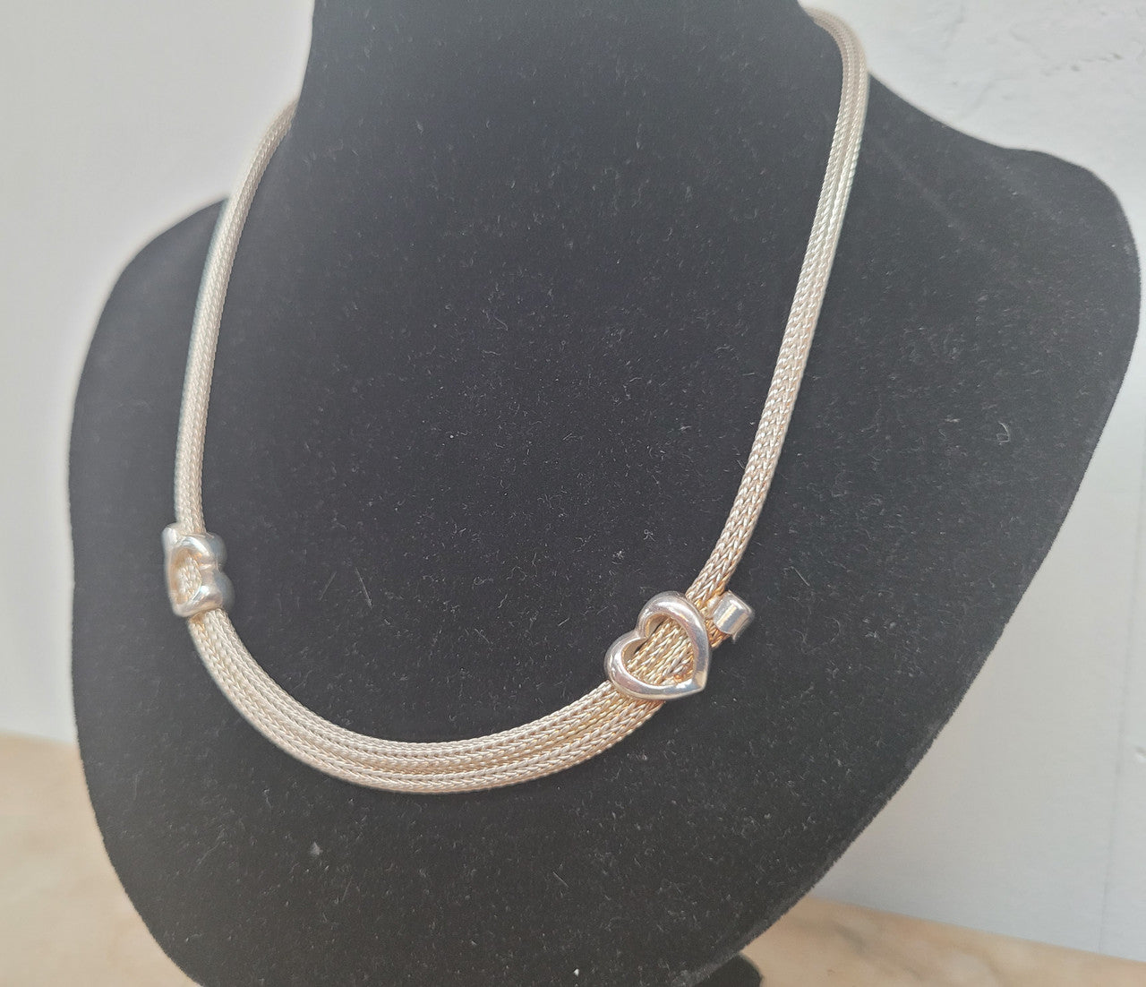 Beautiful Italian sterling silver woven double heart necklace. In good condition.