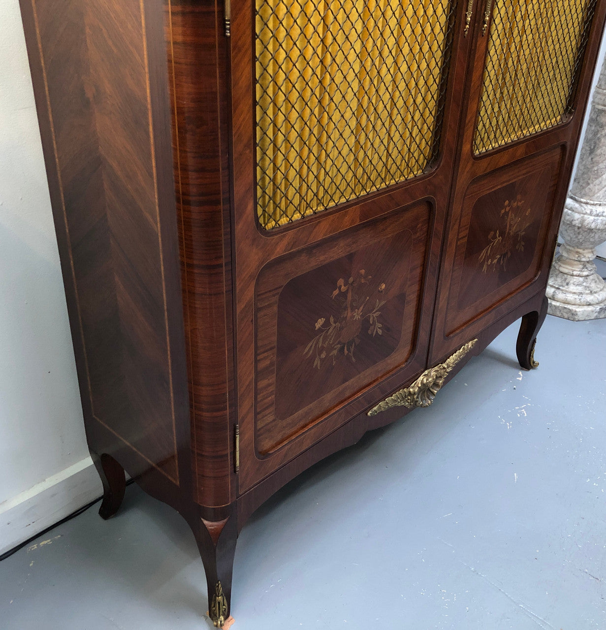 Beautiful 19th Century French Louis XV style Mahogany Blind Bookcase. This piece has lovely inlaid doors and ormolu mounts, marble top and four adjustable shelves. In good original detailed condition.