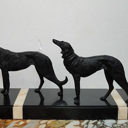 French Art Deco cold painted spelter, group of two hounds standing on a beautiful piece of marble base. Signed by Leduc and in good original condition.