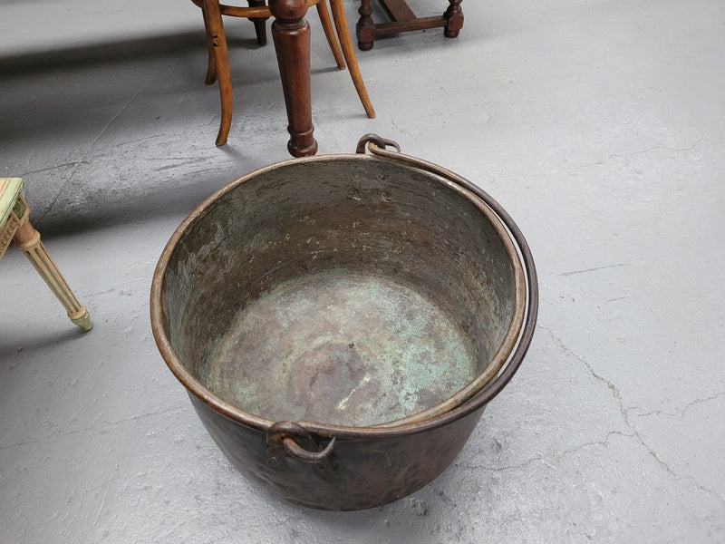 Sourced in France is this large Antique French brass firewood pot with handle. It is in original condition with some signs of wear please view photos.