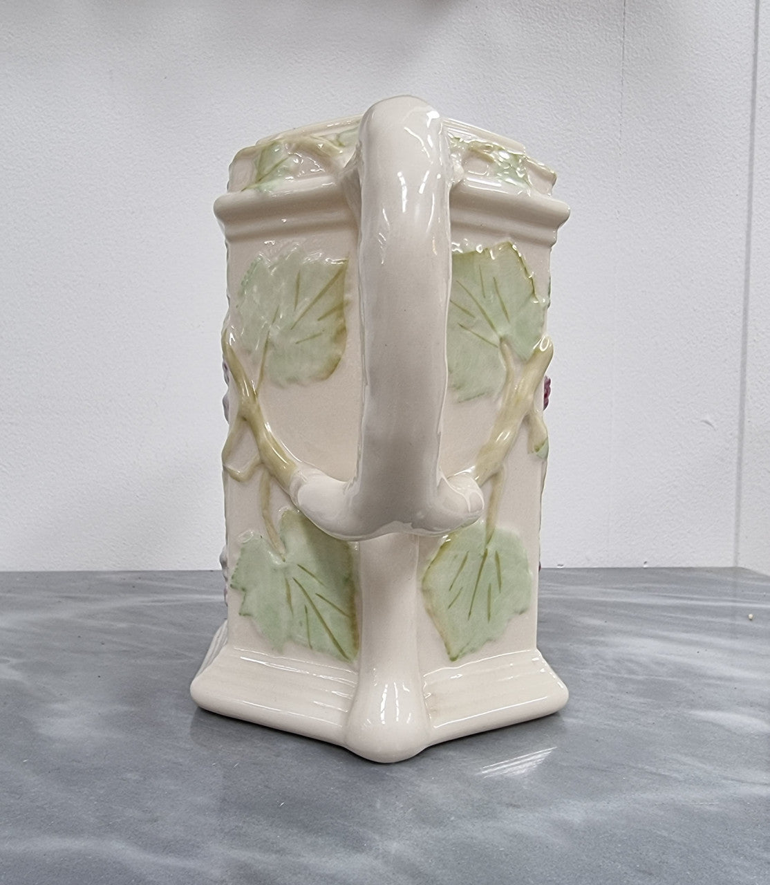 Belleek brown stamp (1980 – 1993) jug with ivy decoration, branch handle and Bacchus spout. It is in good original condition, please view photos as they help form part of the description.