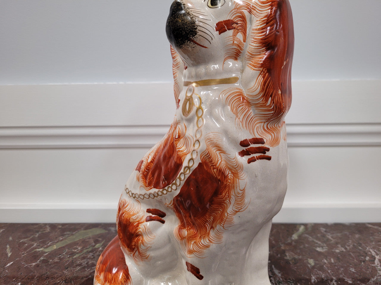 Antique Staffordshire dog statue. Please view photos as they help form part of the description.