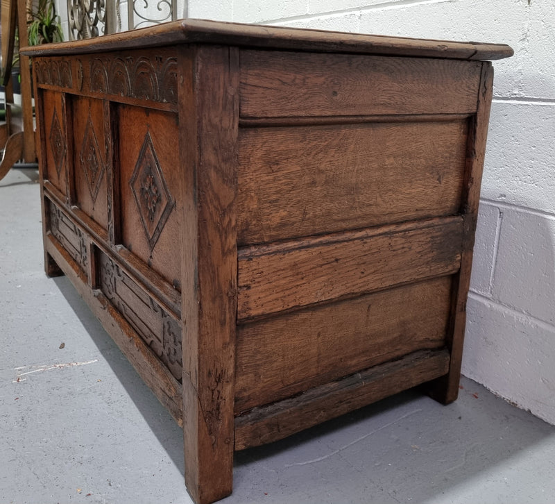 Early 19th Century French Oak carved coffer with a lift up lid for storage. A beautiful piece and in good original condition.