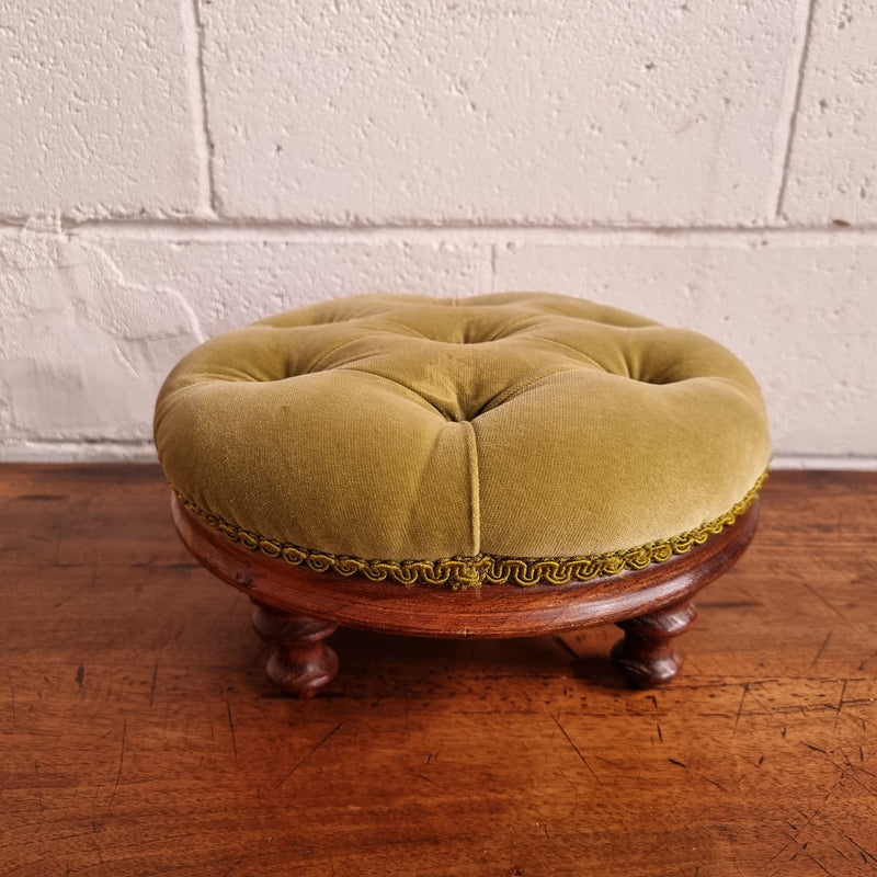 Vintage round upholstered buttoned footstool. Sourced locally and is in good original condition, please view photos as they help for part of the description.