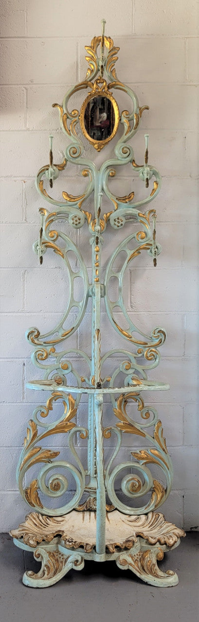 Very attractive 19th Century French cast iron painted and gilded hall stand with original small mirror. Sourced from France and in good original condition.