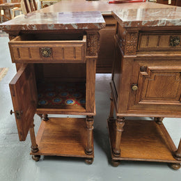 Pair French Oak Henry II style rouge marble topped bedside cabinets. Consisting of one drawer, one cupboard and a bottom shelf. Carved decoration and turned legs. Circa: 1900's.