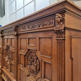 Impressive and grand French Oak Renaissance style sideboard. Beautifully detailed carvings and plenty of storage with three very large cupboards with a total of eight adjustable shelves along with three large drawers. It has been sourced from France and is in very good original detailed condition.