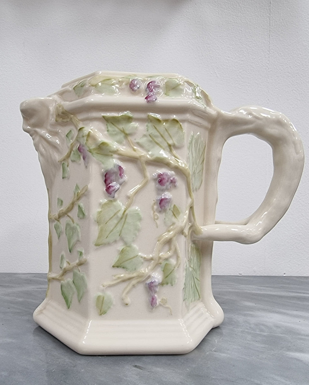 Belleek brown stamp (1980 – 1993) jug with ivy decoration, branch handle and Bacchus spout. It is in good original condition, please view photos as they help form part of the description.