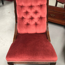 Beautiful pair of carved Edwardian arm chairs with lovely pink upholstery with button backs. In good condition.