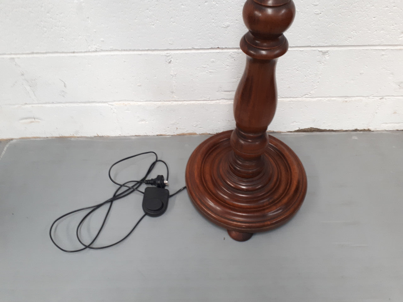 Antique Walnut standard lamp, with foot switch and in good working order condition.