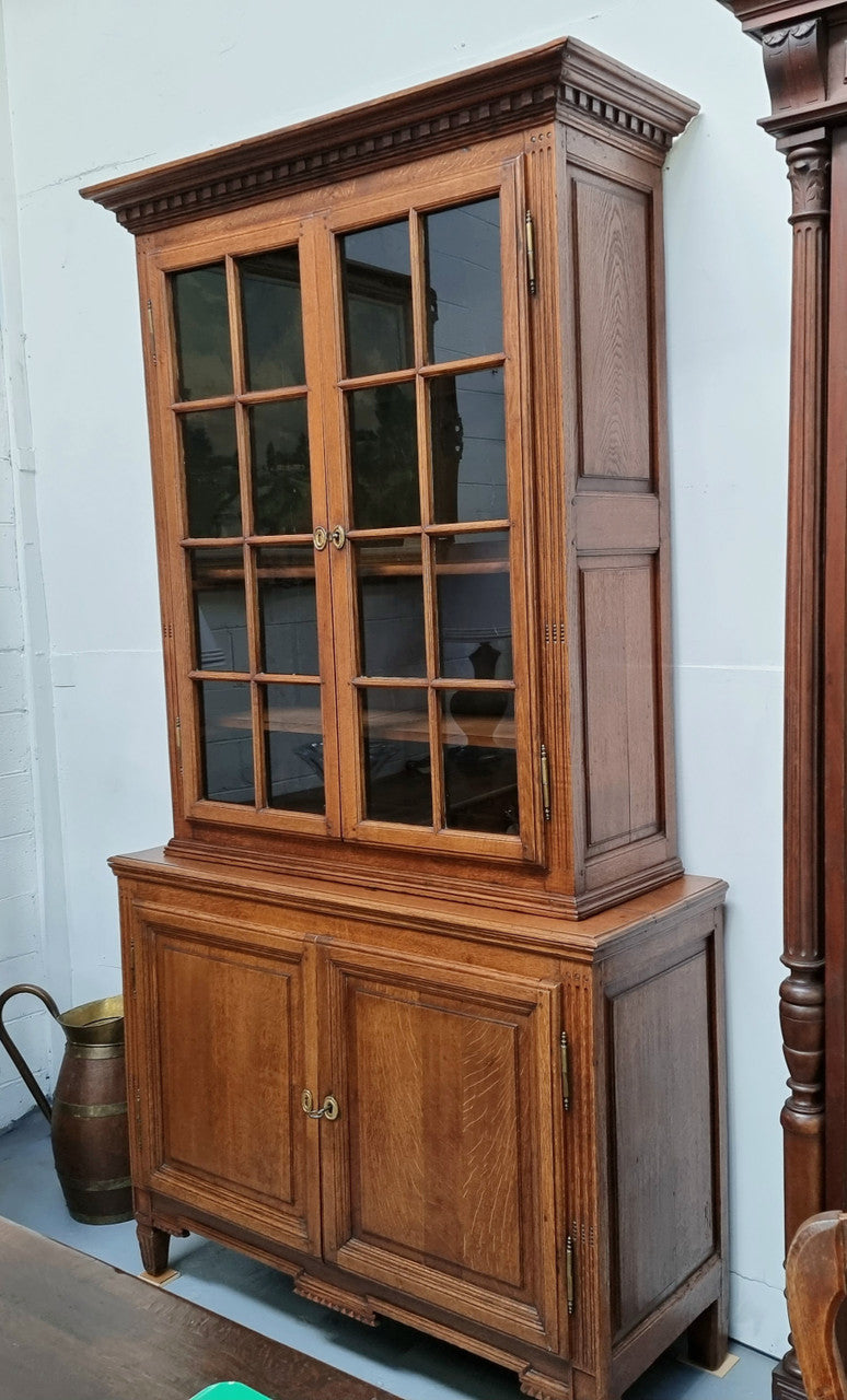 Beautiful 19th Century French Oak four door bookcase with 3 adjustable shelves and 1 fixed shelf in good detailed original condition.