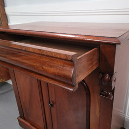 Cedar side cabinet with two doors one drawer and lovely door panels and corbels. It has been sourced locally and is in good original detailed condition.