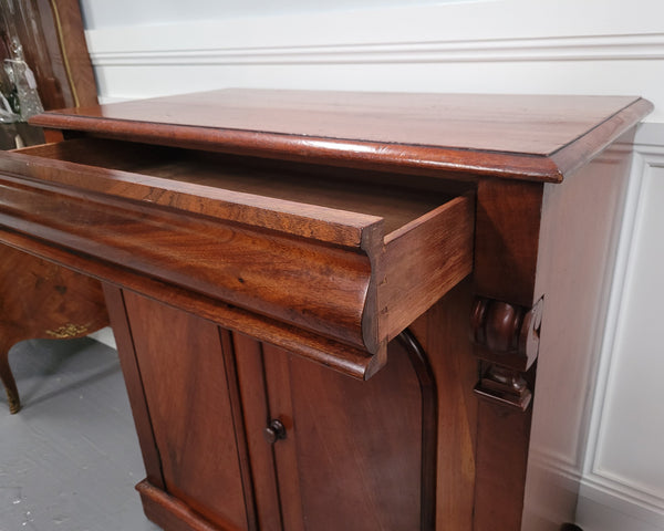 Cedar side cabinet with two doors one drawer and lovely door panels and corbels. It has been sourced locally and is in good original detailed condition.