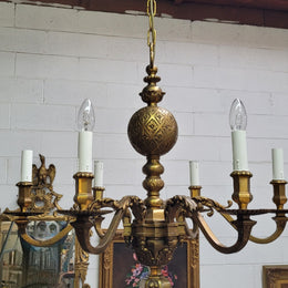 Stunning six arm French bronze chandelier. It can be used with or without shades. It has been fully rewired to Australian standards. It is in good original detailed condition.