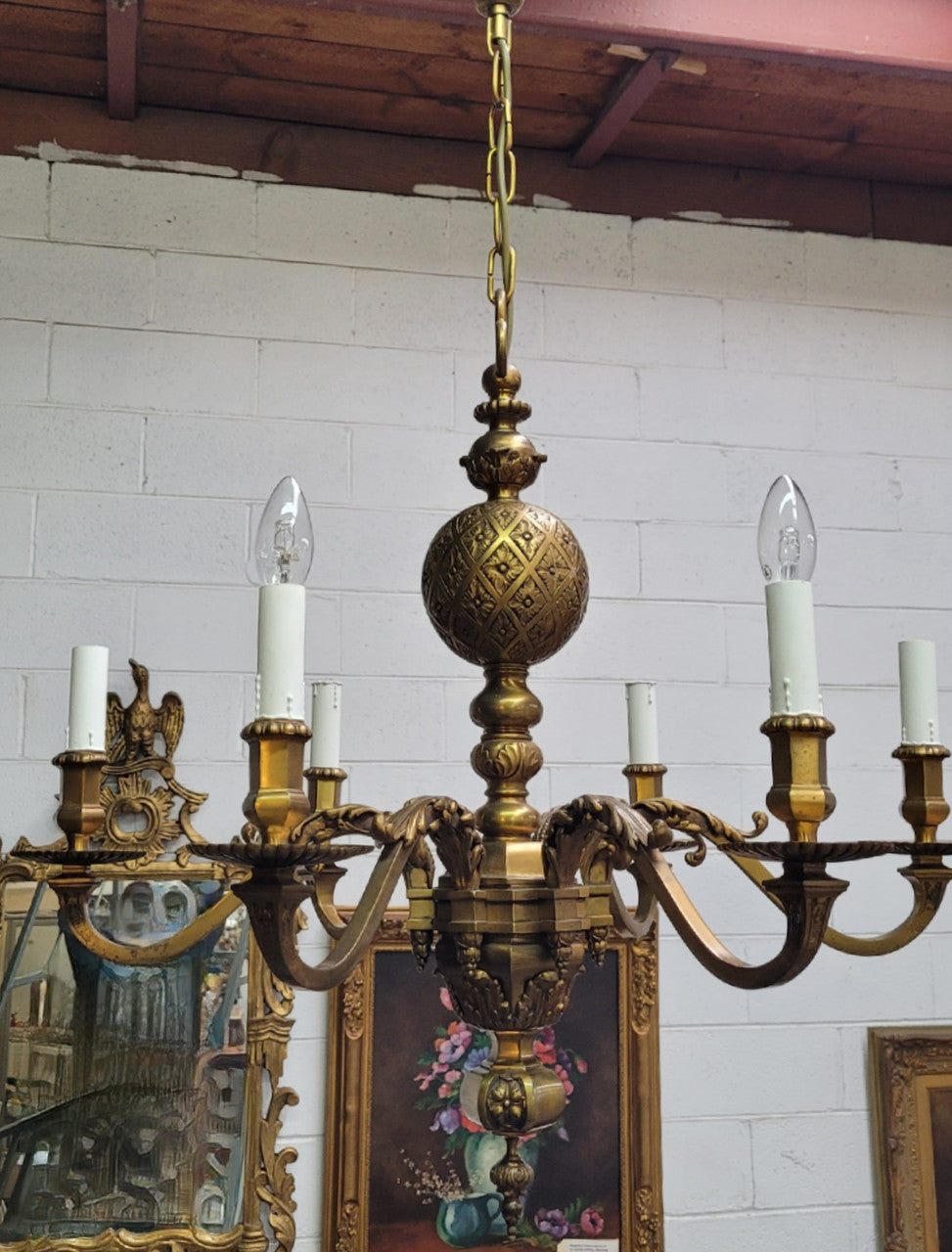 Stunning six arm French bronze chandelier. It can be used with or without shades. It has been fully rewired to Australian standards. It is in good original detailed condition.