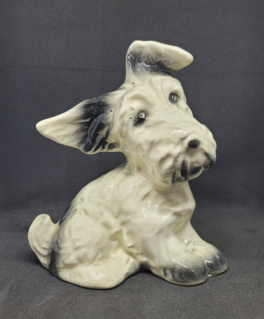 Charming vintage black and cream ceramic dog ornament. In good original condition.