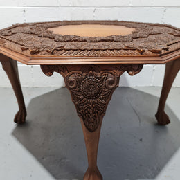 Heavily carved Teakwood round Chinese coffee table. In good original detailed condition. Circa: 1920