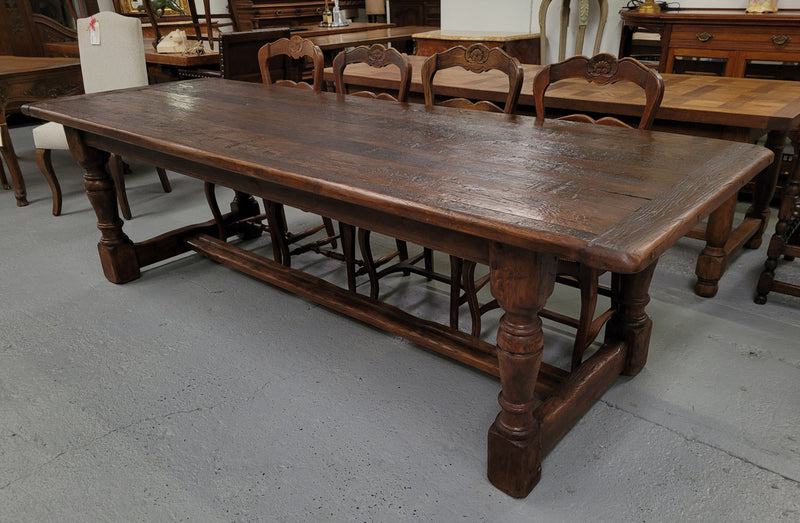 Amazing 2.65 meter French Elm Refectory dining table with loads of rustic charm. This table has been sourced from France and can comfortably seat ten people. It is in good original detailed condition.