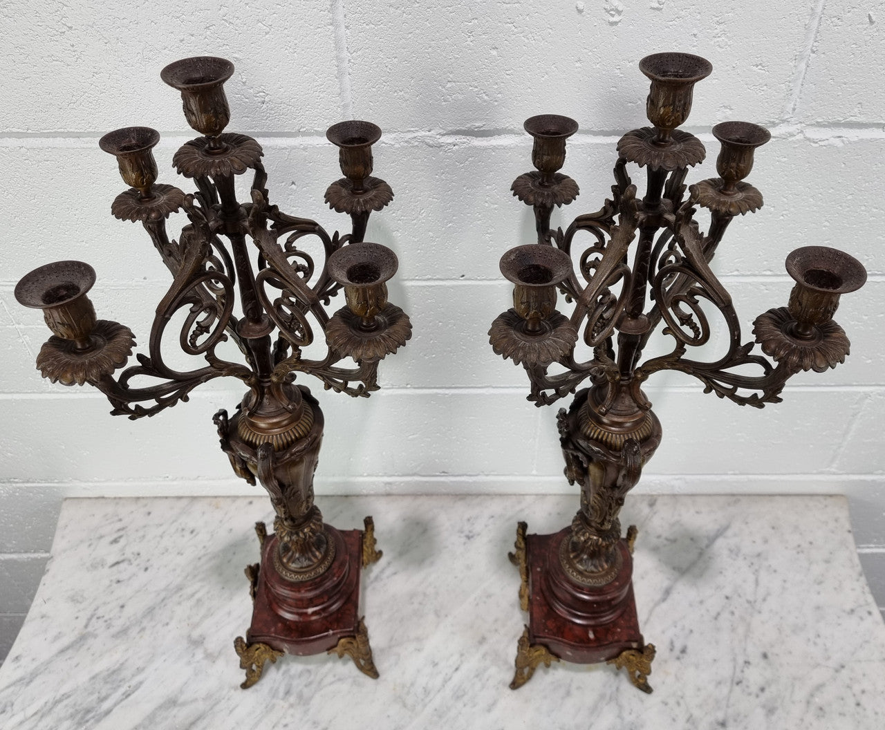 Pair of decorative Antique French spelter and marble candelabras. in very good original detailed condition.