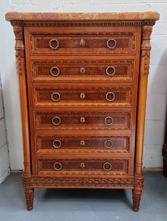 French walnut and burr walnut chest of six drawers with a beautiful decorative marble top and decorative round handles. In good original detailed condition.