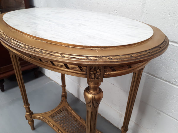 Antique French 19th century Louis XVI style oval inset marble top & giltwood salon/side table. In good condition. Circa 1890.
