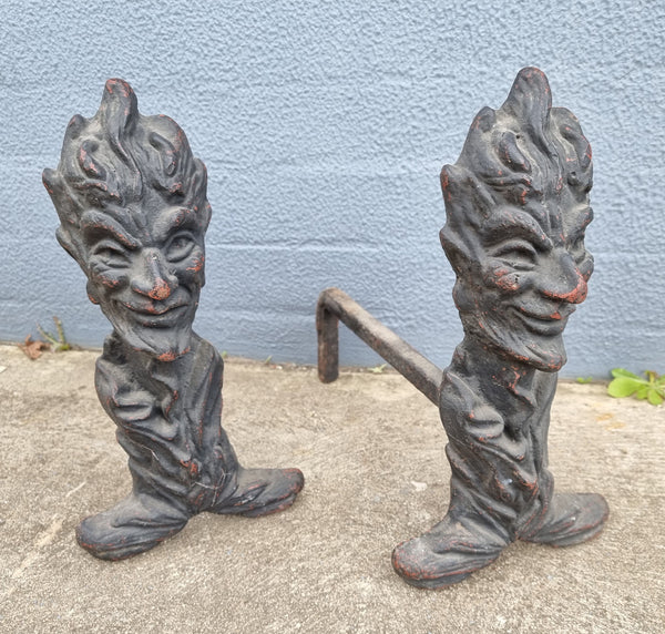 Fabulous rustic pair of French cast iron fire dogs. They are in good original condition.