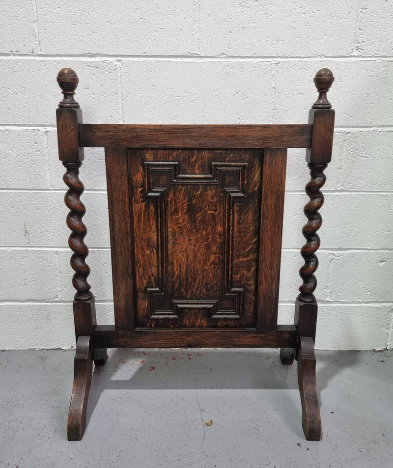 Antique English Oak Jacobean Style fire screen. In good original condition.