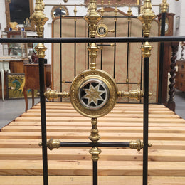 Rare Antique cast iron and brass Victorian queen size bed. Comes with custom made slats.  It has been sourced locally and is in good original condition.