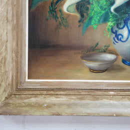 Signed and sourced in France a vintage oil on board still life of white lillie's in vase. In a beauitufl frame and it is in good original detailed condition.