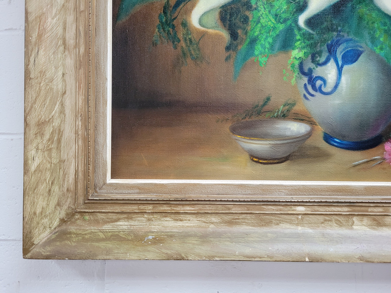 Signed and sourced in France a vintage oil on board still life of white lillie's in vase. In a beauitufl frame and it is in good original detailed condition.