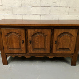 Solid and rustic French oak three door cabinet with plenty of room for storage and all doors lock with heavy duty iron keys.