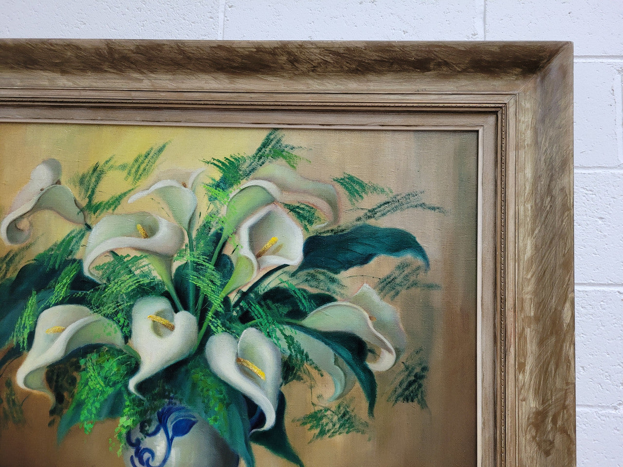 Signed and sourced in France a vintage oil on board still life of white lillie's in vase. In a beauitufl frame and it is in good original detailed condition.