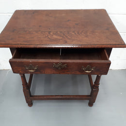 A late 18th century French oak side table with drawer with exceptional patina and is in good condition. Circa 1800.