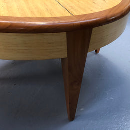 Lovely Vintage round Mahogany and blonde wood coffee table by (Alexander J Cook). It is in good original condition.