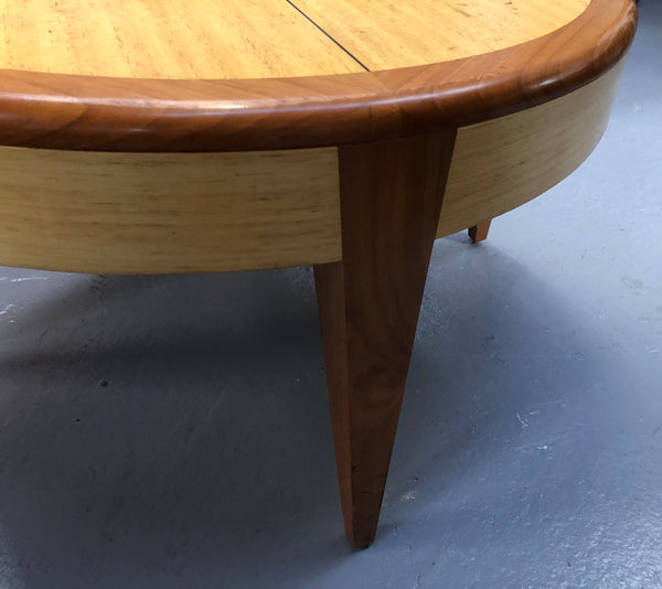 Lovely Vintage round Mahogany and blonde wood coffee table by (Alexander J Cook). It is in good original condition.